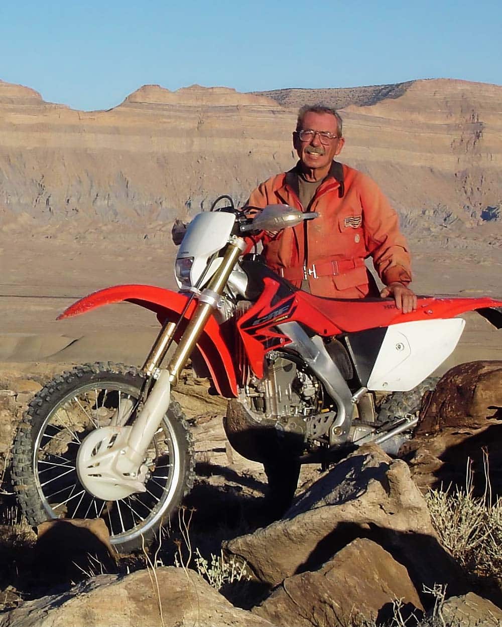 Richard “Dick” Brass with his dirt bike in the San Rafael Swell